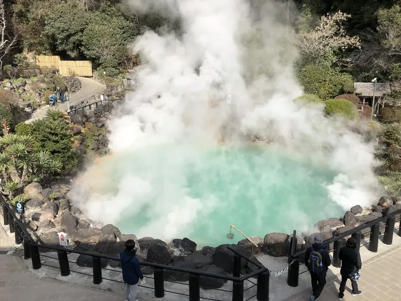 Bright blue water and thick steam at Umi Jigoku in Beppu